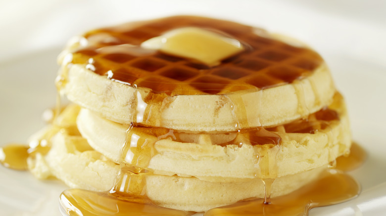 waffles coated with maple syrup