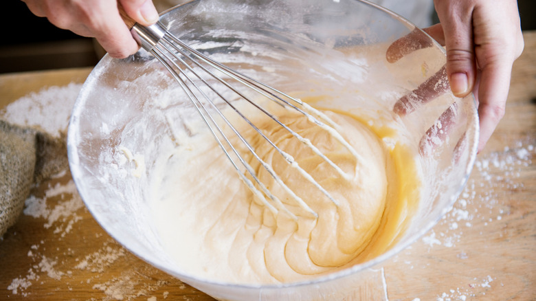 cake batter being stirred.