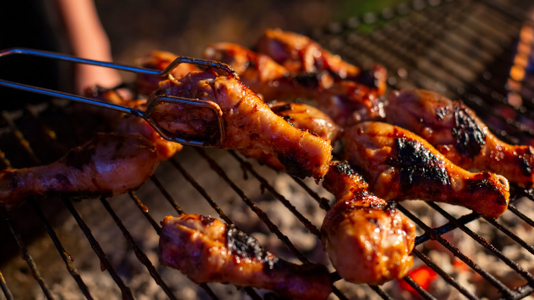 drumsticks grilling on barbecue