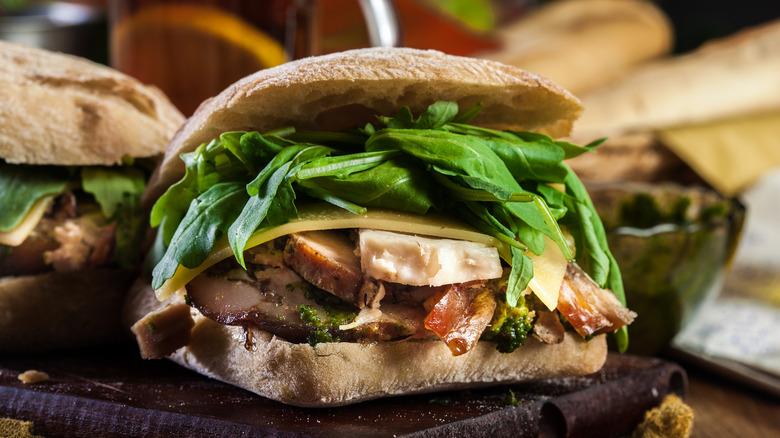 Porchetta sandwich with arugula 