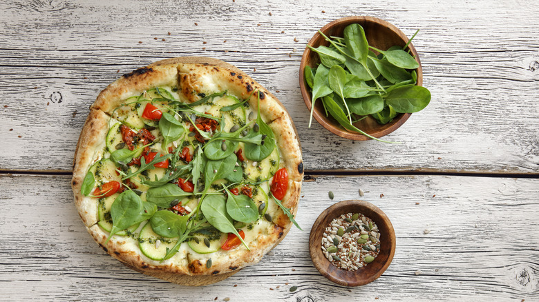 pesto pizza with greens