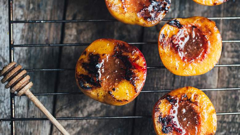 peach halves cooling on rack