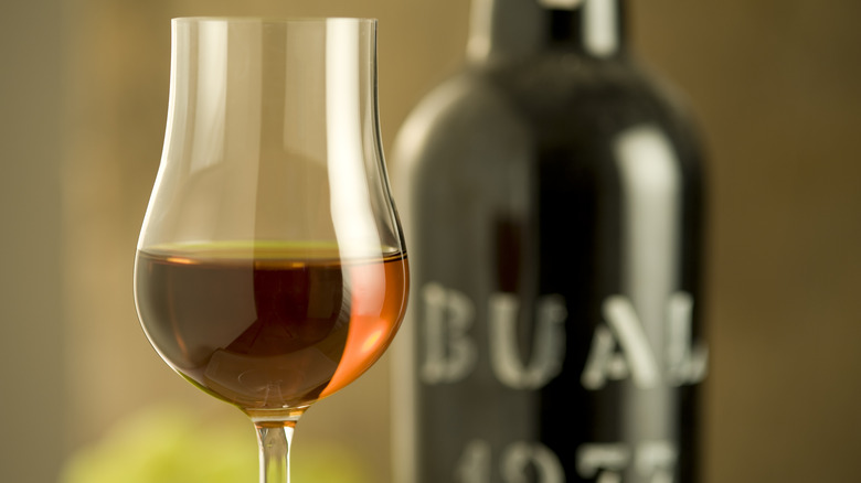 glass and bottle of Madeira wine