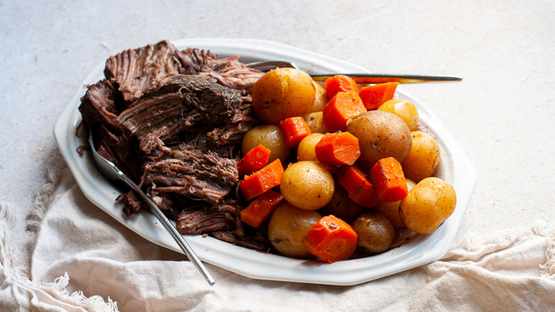 Pot roast and vegetables on platter