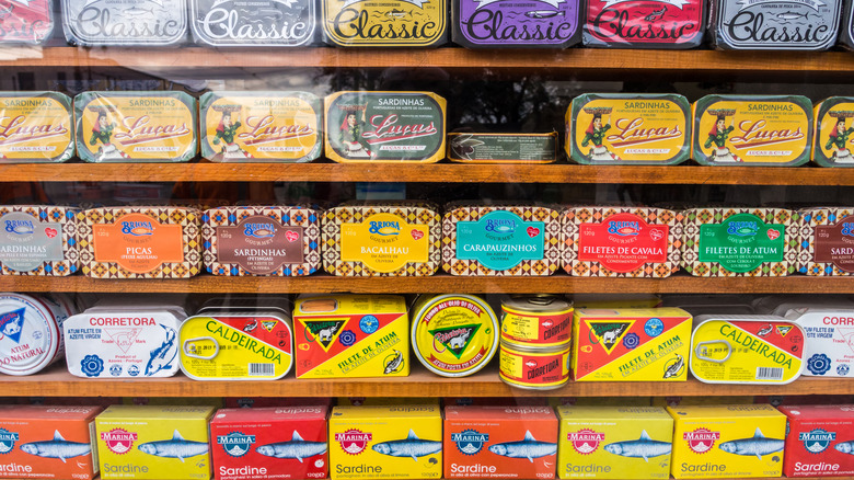 canned fish displayed on shelves