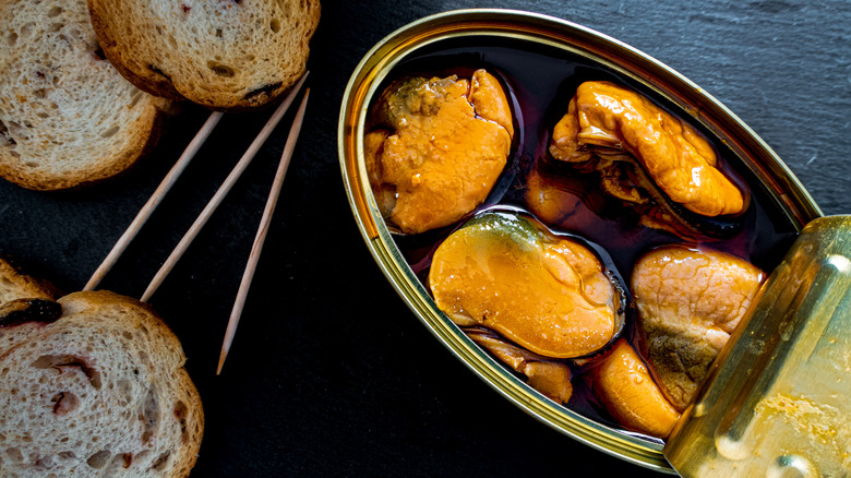 Canned mussels in open tin