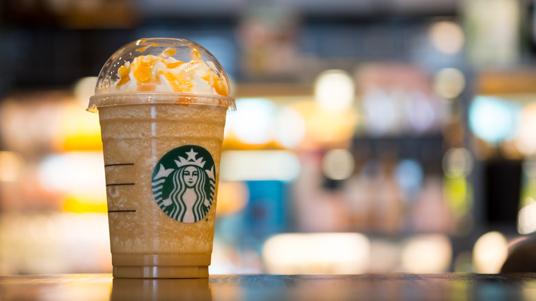 Caramel frappuccino on table 