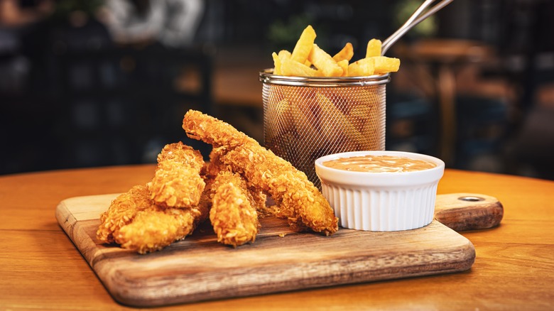 fried chicken strips with fries