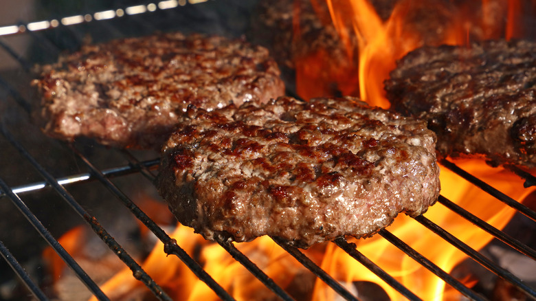 burger patties on grill