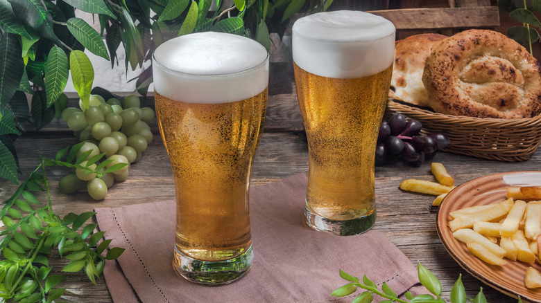 Two glasses of pilsner beer