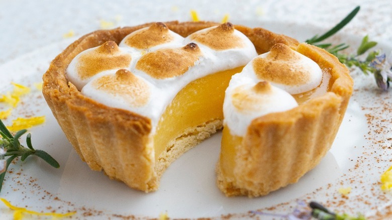 A lemon pie on a plate