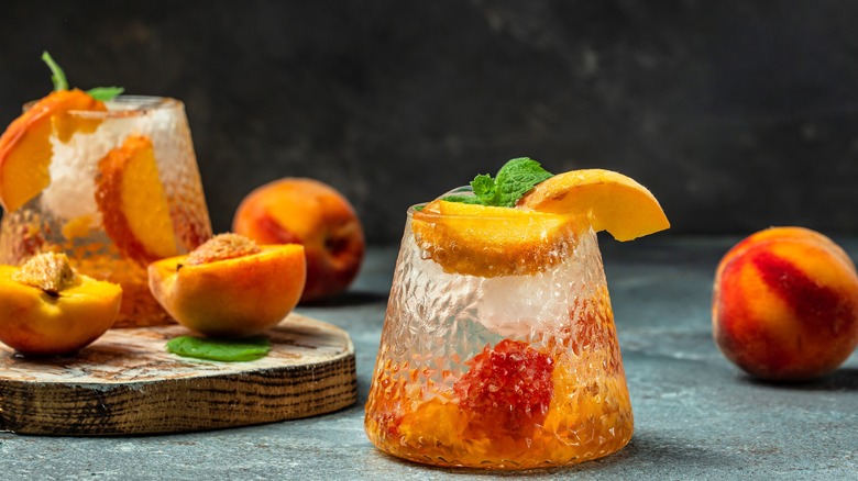 Peach whiskey smash in glass