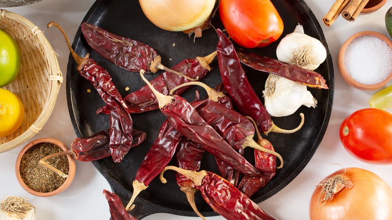 dried chiles in comal pan