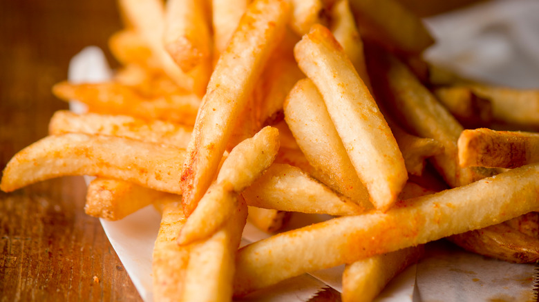 close up of hand cut french fries 