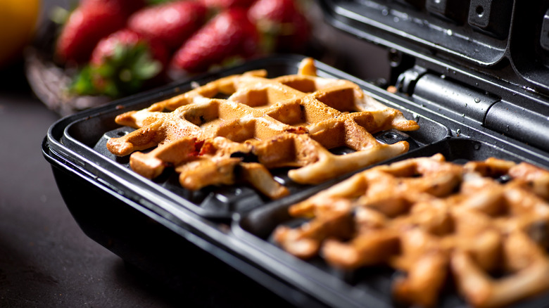 Making waffles on a waffle maker