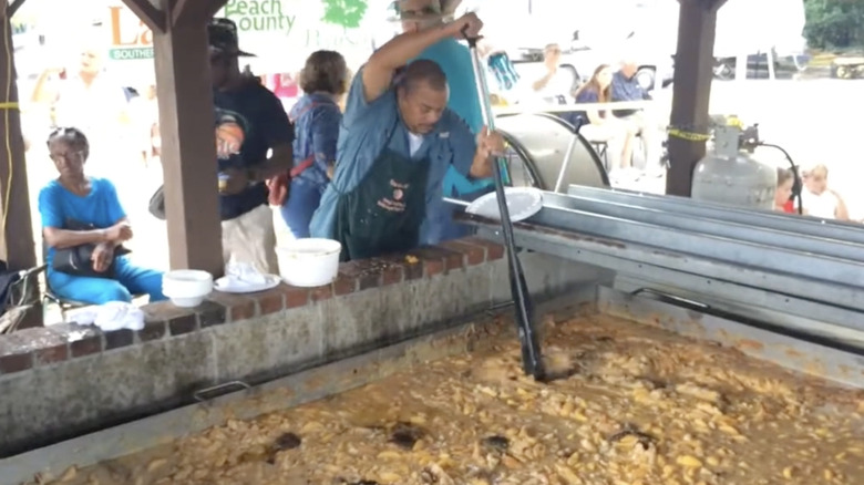 Baker mixes peach cobbler with canoe paddle