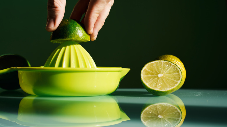 Person juicing limes