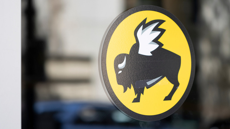 Buffalo Wild Wings logo emblem mounted on glass