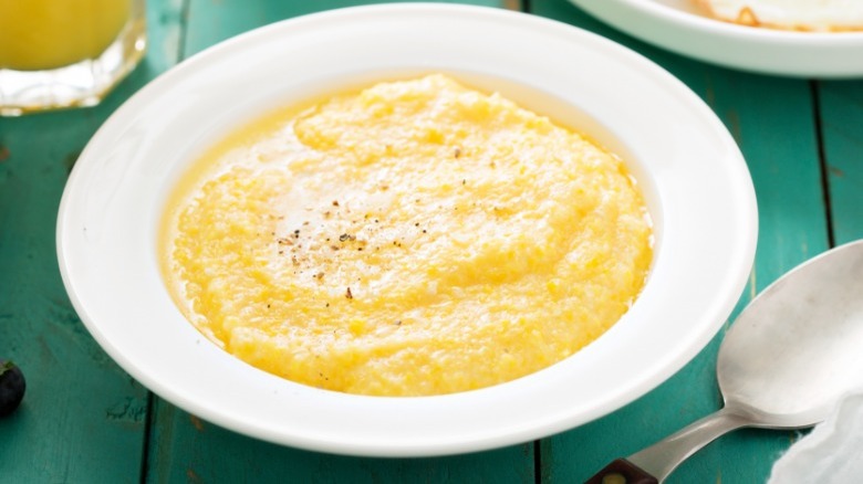cheesy grits in white bowl
