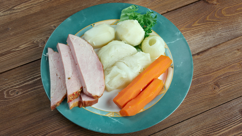 boiled dinner on blue plate