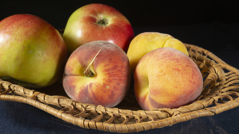 basket of apples and peaches