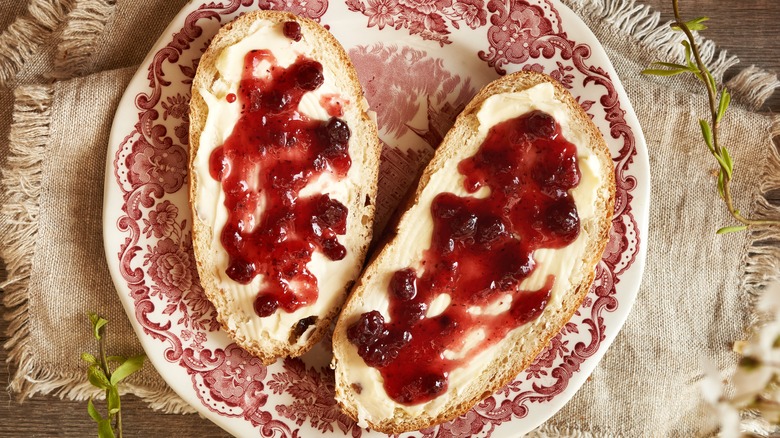 slices of bread with butter and cranberry