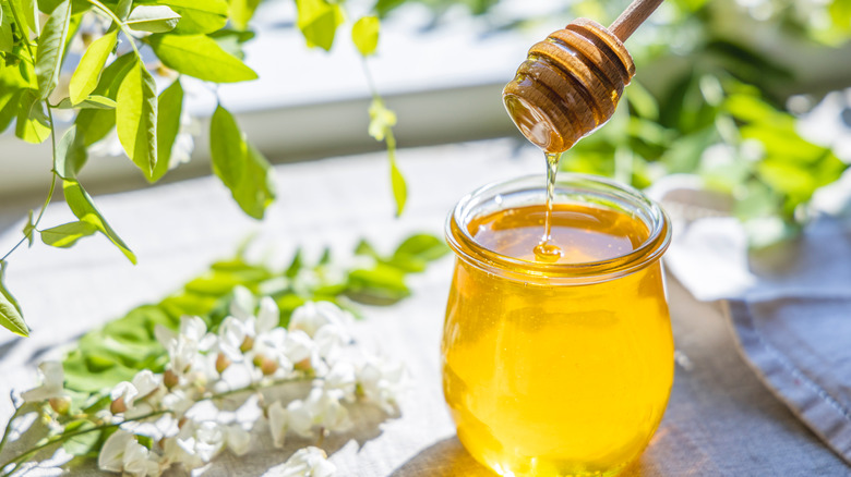 bowl of honey and flowers