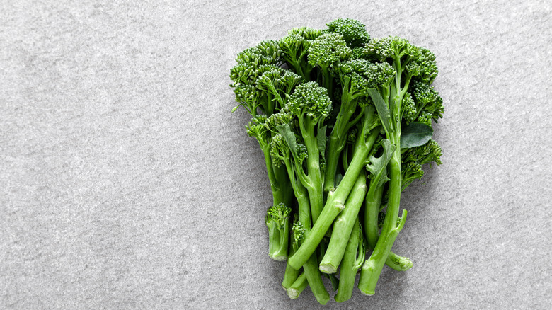 Broccolini on gray background