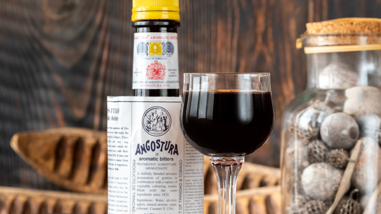 Angostura bitters displayed with drink