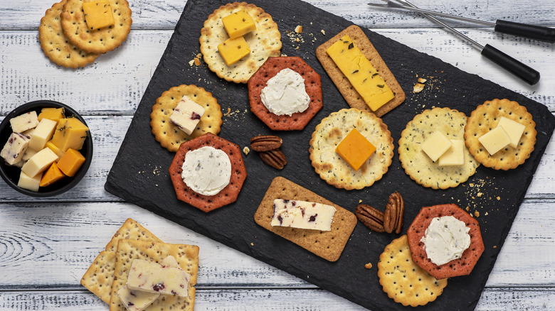 different types of cheese and crackers