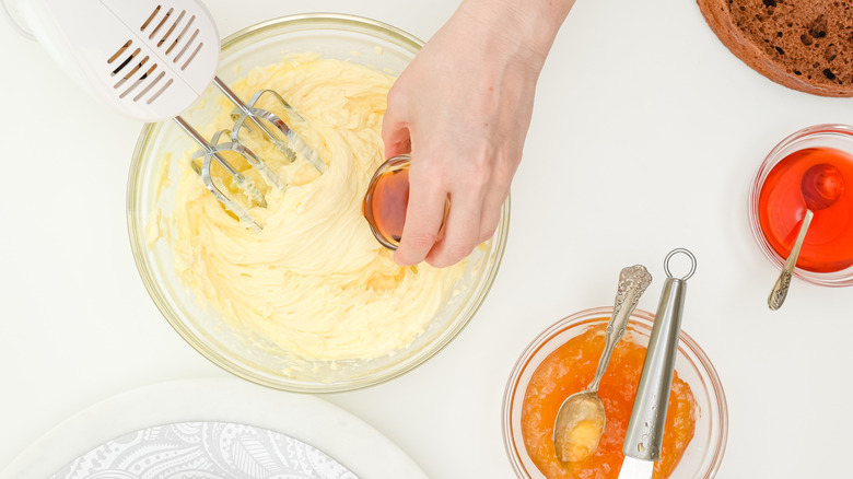 adding shot of liquor to cake batter