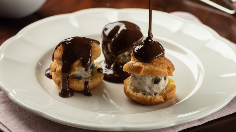 Chocolate covered profiteroles