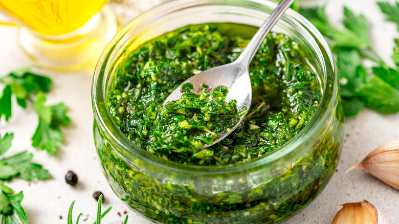 parsley persillade sauce in jar