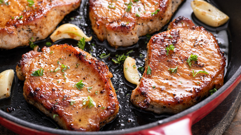 pork chops in a frying pan