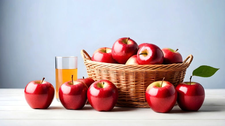 basket of apples and fresh apple juice