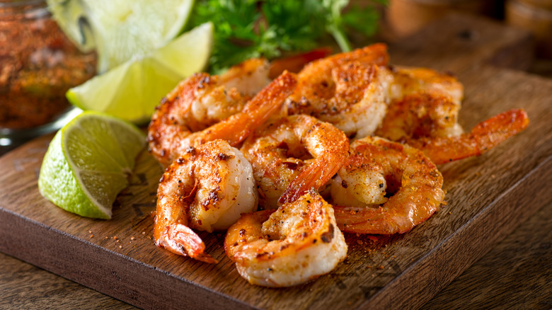 cooked shrimp on cutting board