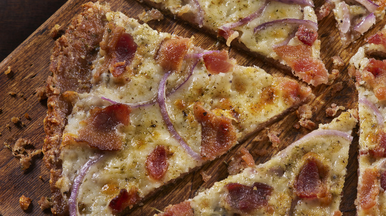 chicken crust pizza with bacon and onion