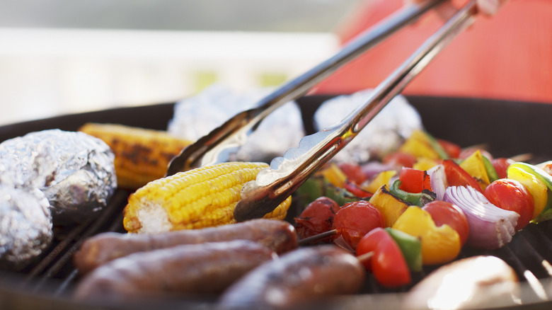 grilling corn sausage veggies