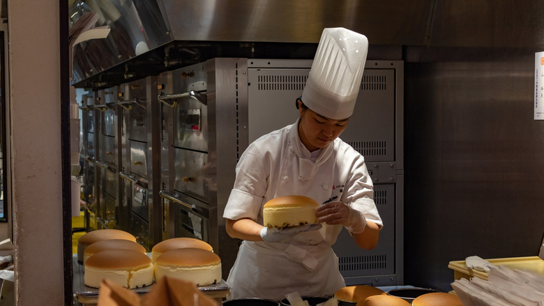 Baker making Japanese cheesecake