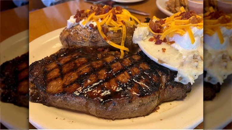 sirloin steak and baked potato at Texas Roadhouse