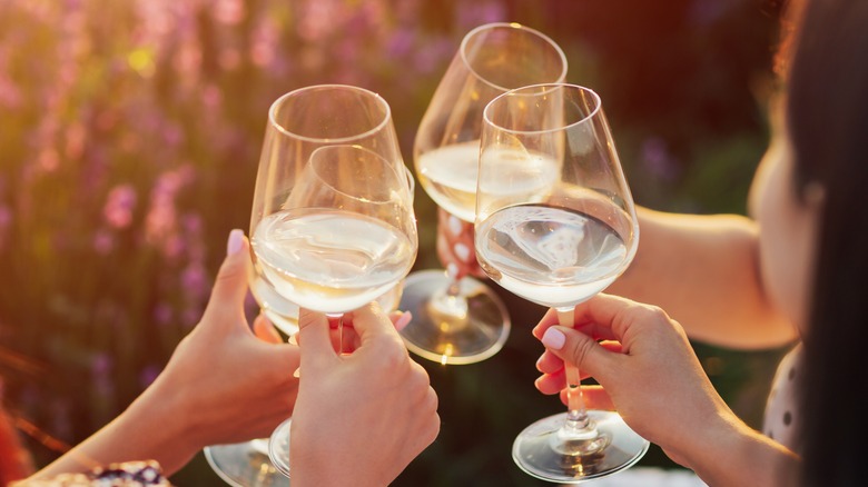 Women drinking white wine