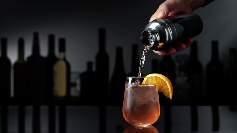 bartender pouring drink