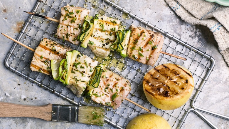 grilled fish and lemon halves