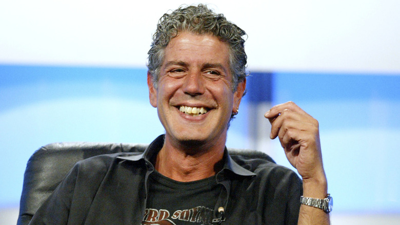 Anthony Bourdain smiling at event
