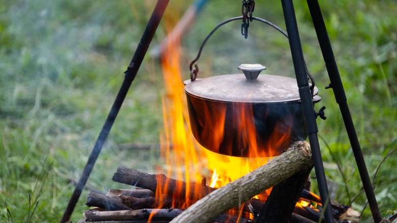 Pot cooking over a fire
