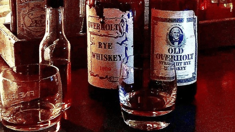 vintage bottles of Old Overholt