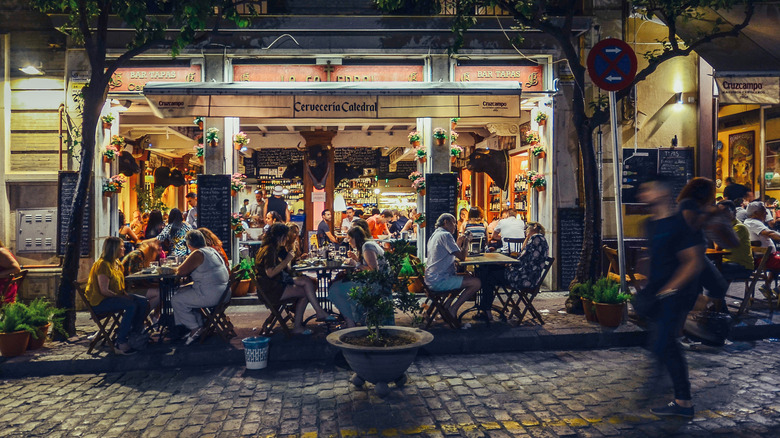 Diners enjoy a late dinner