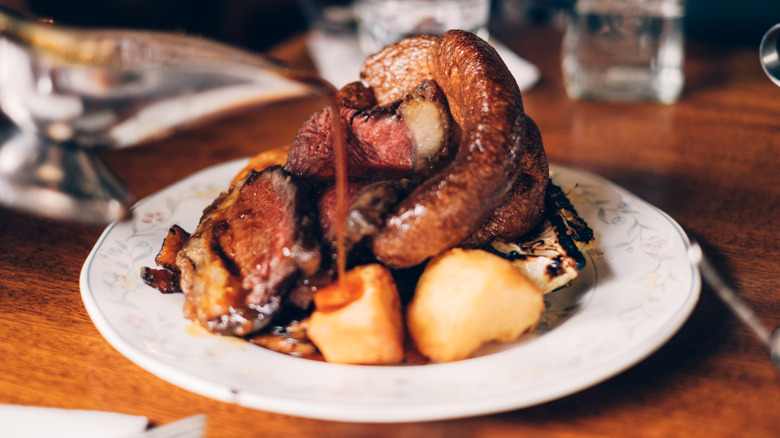 plate of sunday roast with yorkshire pudding