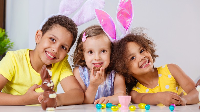 kids with chocolate bunny