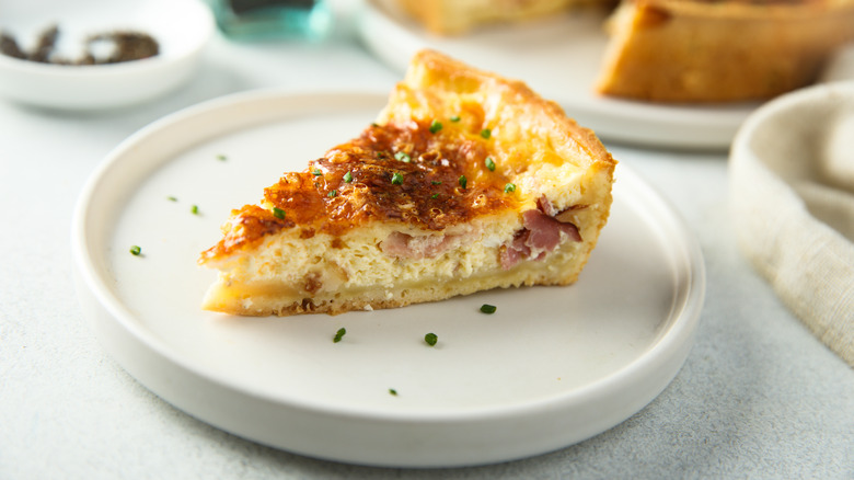 Slice of ham and cheese quiche